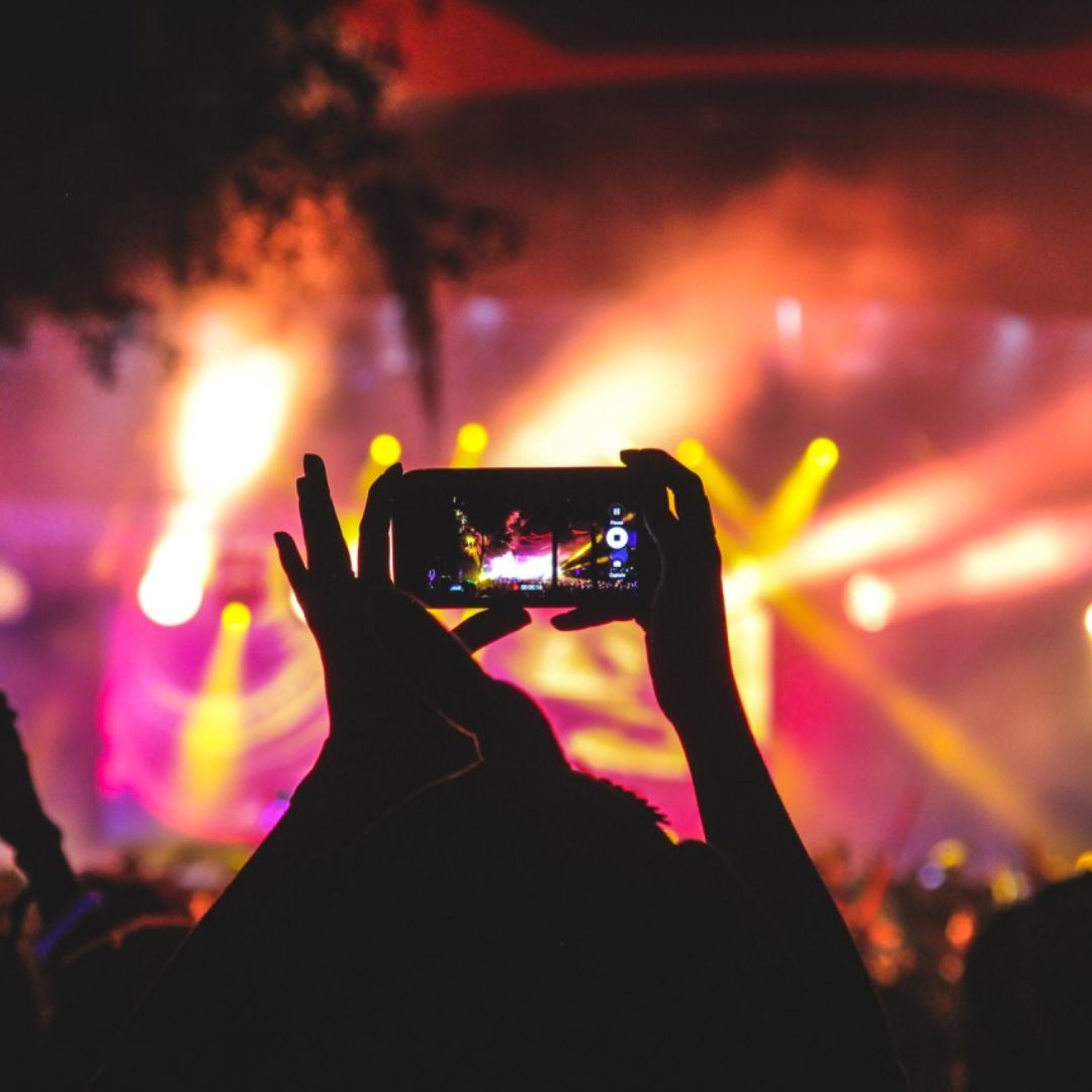 A phone taking a photo of a stage